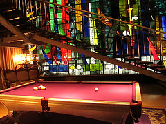 Cozy room with red billiards table