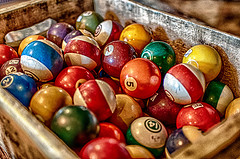 Billiards balls in a huge tray