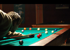 Man playing billiards